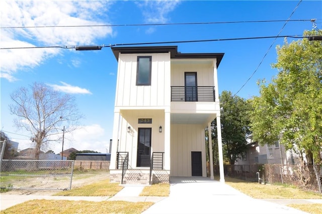 view of front of house with a balcony