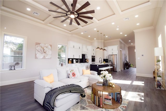 living room featuring coffered ceiling, dark hardwood / wood-style flooring, and beamed ceiling