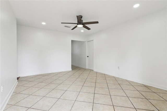 empty room with a ceiling fan, recessed lighting, and visible vents