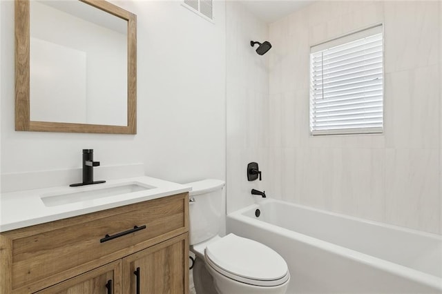 bathroom featuring washtub / shower combination, visible vents, toilet, and vanity
