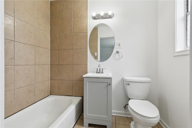 bathroom with tile patterned floors, vanity, and toilet