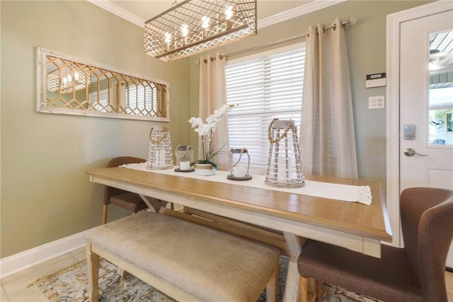 6900 Royal St, Arabi, LA 70032 - tiled dining room with ornamental molding and baseboards