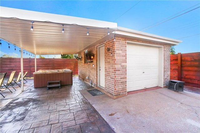 6900 Royal St, Arabi, LA 70032 - fenced backyard featuring a hot tub and a patio