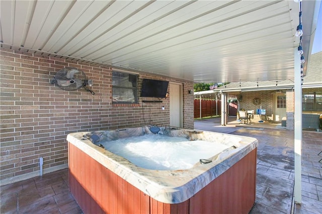 6900 Royal St, Arabi, LA 70032 - view of patio with a hot tub