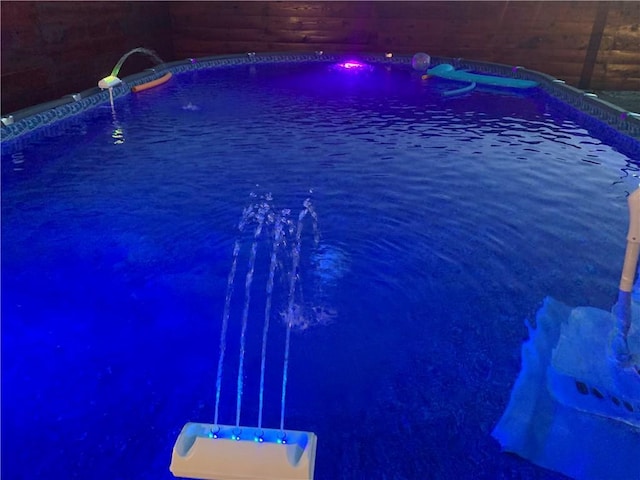 6900 Royal St, Arabi, LA 70032 - pool at twilight featuring an outdoor pool
