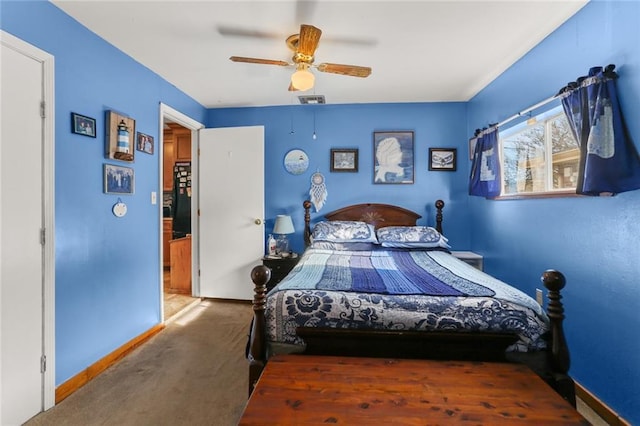 carpeted bedroom featuring ceiling fan