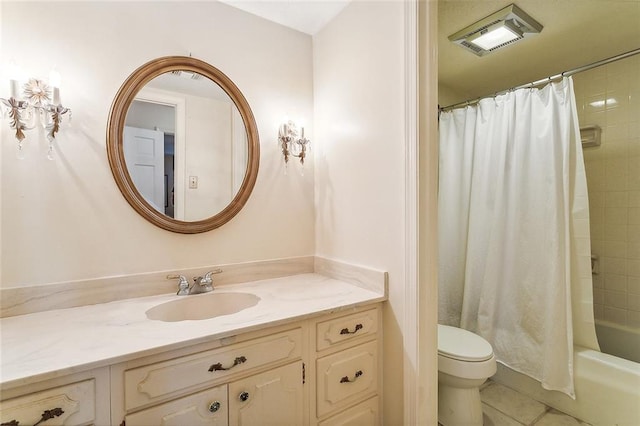 full bathroom featuring vanity, tile patterned floors, toilet, and shower / tub combo with curtain