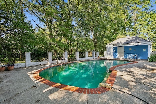 view of pool featuring a patio