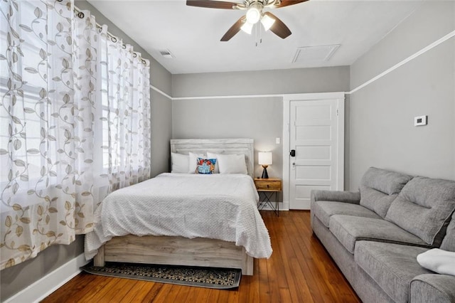 bedroom featuring ceiling fan and wood-type flooring