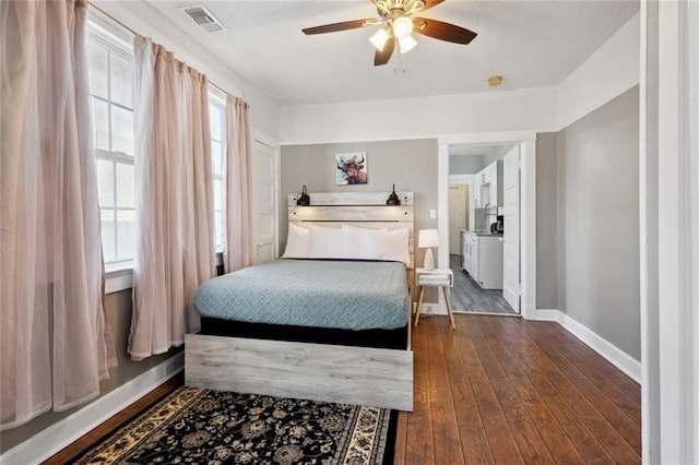 bedroom featuring dark hardwood / wood-style floors and ceiling fan