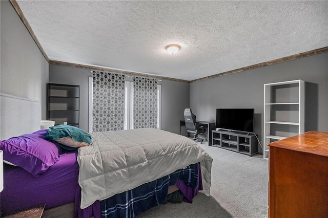 carpeted bedroom with a textured ceiling