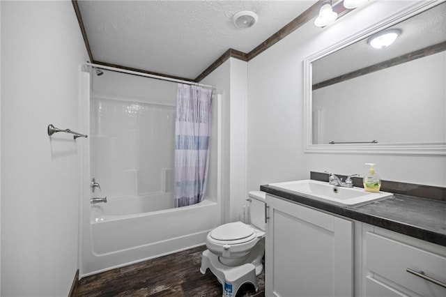 49266 Woodhaven Rd, Tickfaw, LA 70466 - full bathroom featuring toilet, wood finished floors, shower / tub combo with curtain, a textured ceiling, and vanity