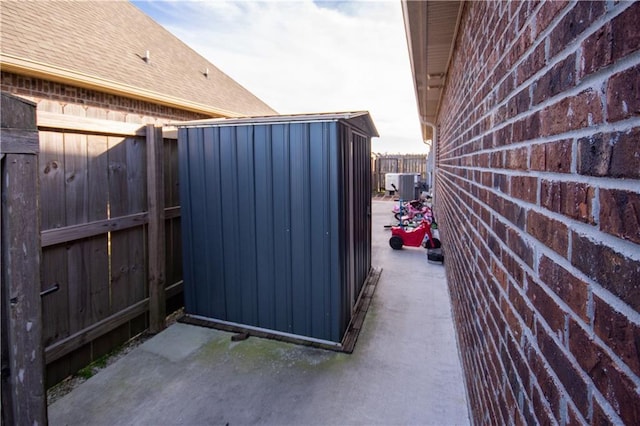 view of home's exterior with a shed