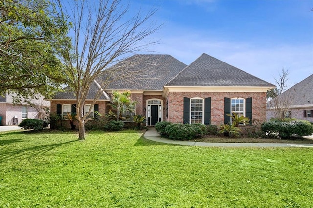 view of front of house with a front lawn