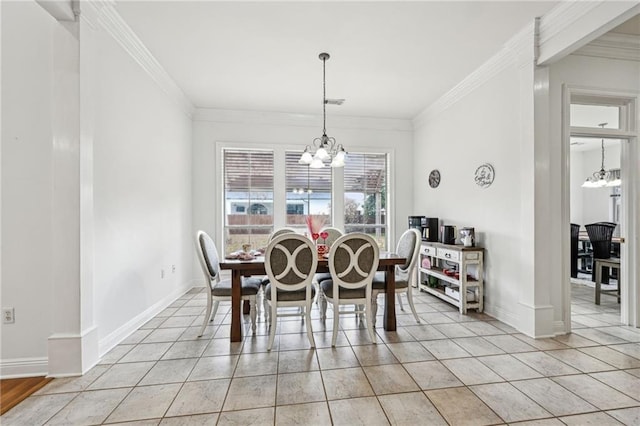 dining room with crown molding, a chandelier, and light tile patterned flooring