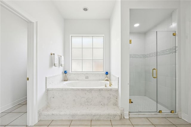 bathroom featuring tile patterned floors and plus walk in shower