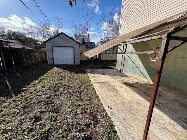 garage featuring a carport