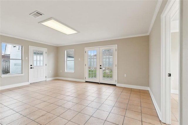 doorway to outside featuring light tile patterned floors, ornamental molding, and french doors