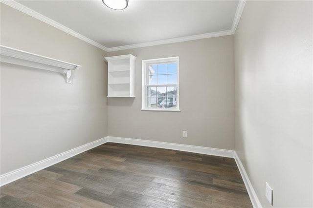 empty room with crown molding and dark wood-type flooring