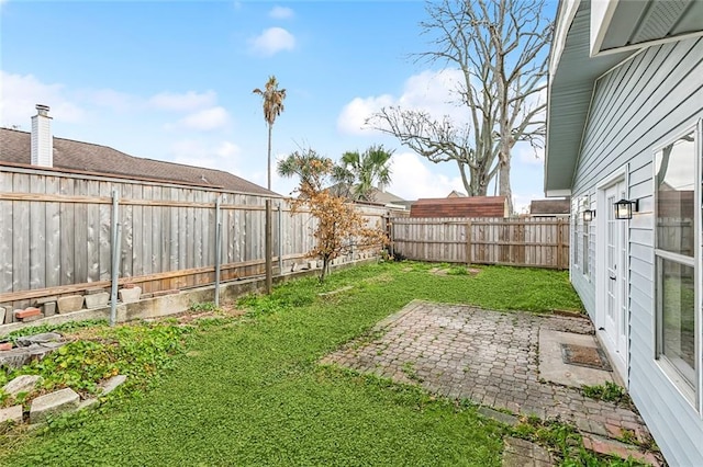 view of yard with a patio area