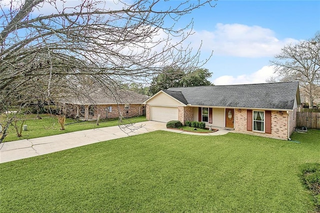 view of front of home featuring a garage and a front lawn