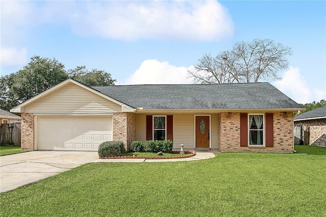 ranch-style house with a garage and a front lawn