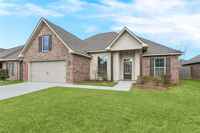 view of front facade with a garage and a front yard