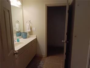 bathroom with vanity and tile patterned floors