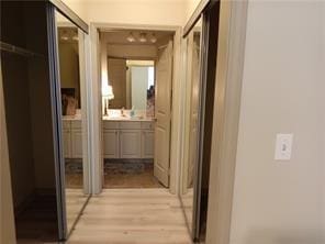 hallway featuring light wood-type flooring