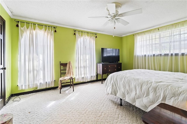 122 Belle Terre Blvd, Covington, LA 70433 - bedroom with ornamental molding, a textured ceiling, multiple windows, carpet floors, and a ceiling fan
