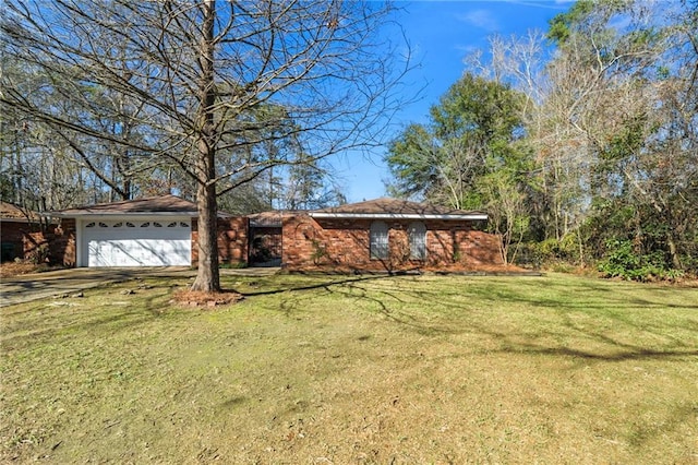 122 Belle Terre Blvd, Covington, LA 70433 - view of green lawn featuring an attached garage and driveway