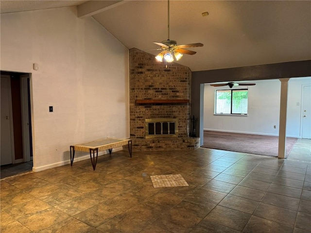 205 Hollow Rock Ct, Slidell, LA 70461 - unfurnished living room with a ceiling fan, baseboards, beamed ceiling, a brick fireplace, and high vaulted ceiling