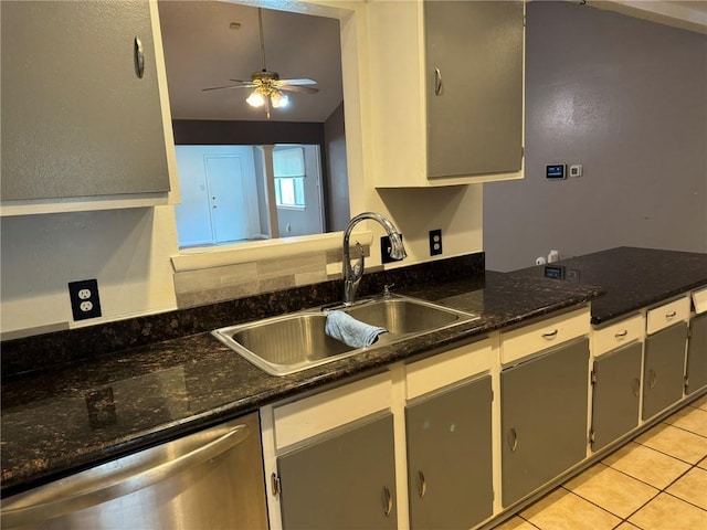 205 Hollow Rock Ct, Slidell, LA 70461 - kitchen with a sink, stainless steel dishwasher, ceiling fan, light tile patterned floors, and a peninsula