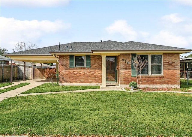 ranch-style house with a carport and a front yard