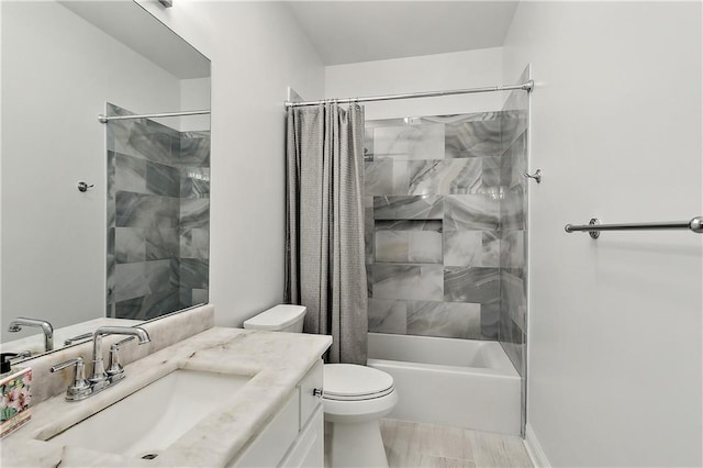 full bathroom featuring vanity, shower / bath combination with curtain, and toilet