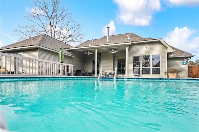 view of swimming pool with ceiling fan