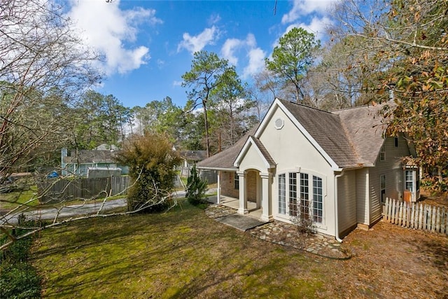 exterior space featuring a lawn