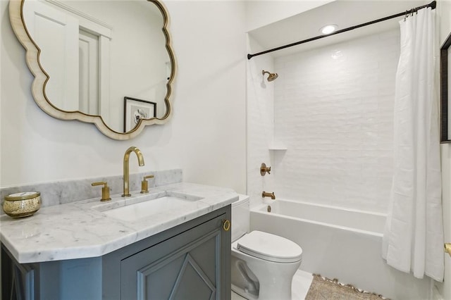 full bathroom featuring shower / bath combo, vanity, and toilet