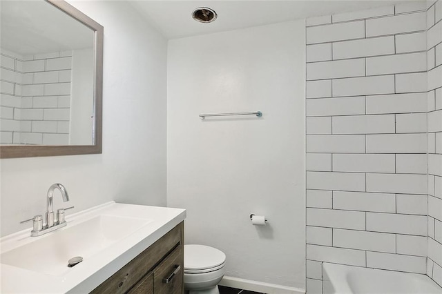 1751 Holiday Dr, New Orleans, LA 70114 - bathroom featuring baseboards, toilet, vanity, and shower / washtub combination