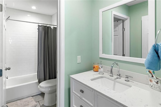 full bathroom with vanity, tile patterned flooring, toilet, and shower / bath combo with shower curtain