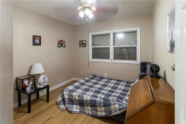 bedroom featuring wood-type flooring