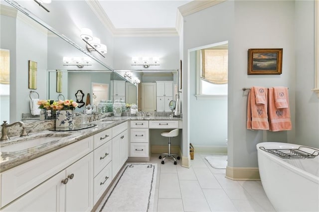 bathroom with tile patterned flooring, vanity, ornamental molding, and a tub