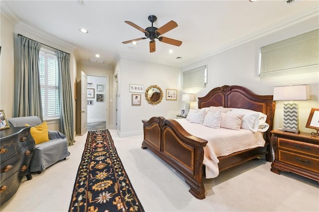 bedroom featuring crown molding, light colored carpet, and ceiling fan