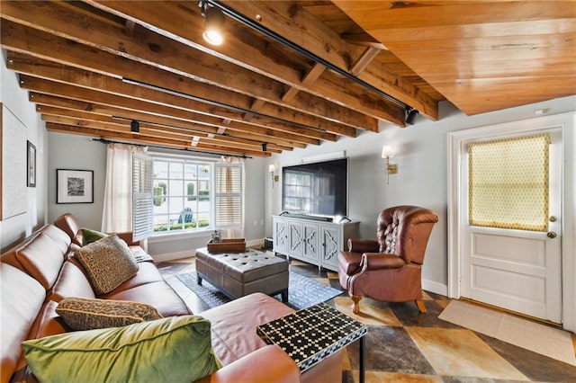 living room with wooden ceiling and beamed ceiling