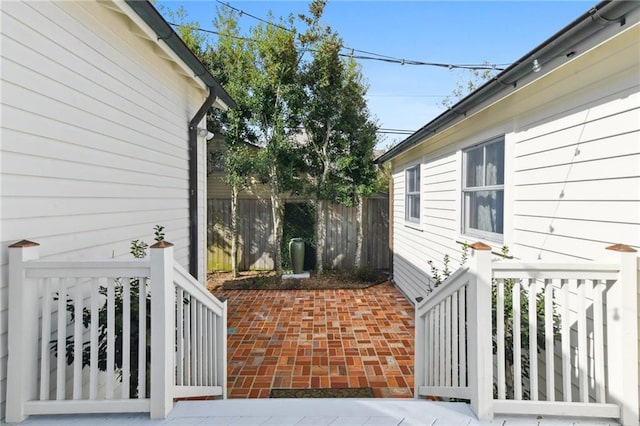 view of property exterior featuring a patio area