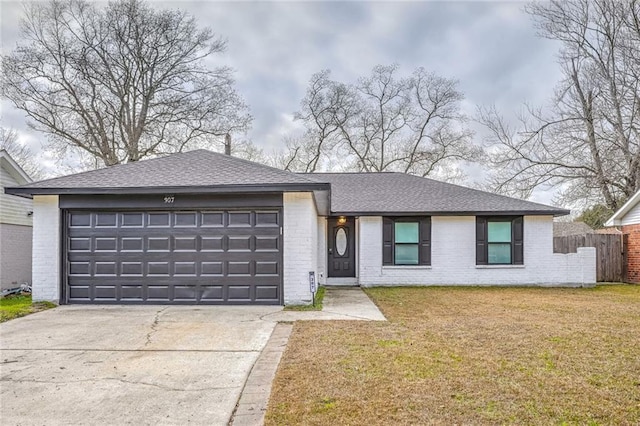 single story home with a garage and a front yard