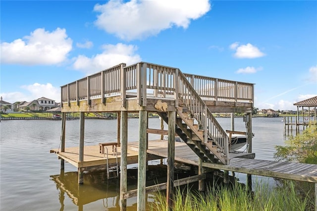 dock area featuring a water view