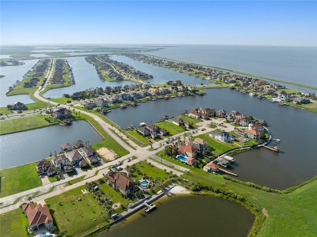 aerial view with a residential view and a water view