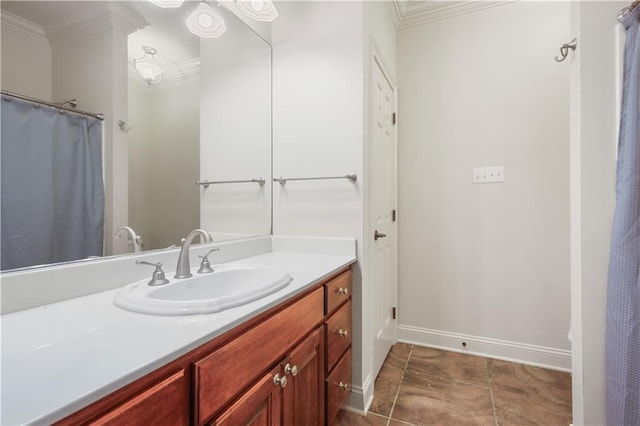 bathroom with vanity and ornamental molding