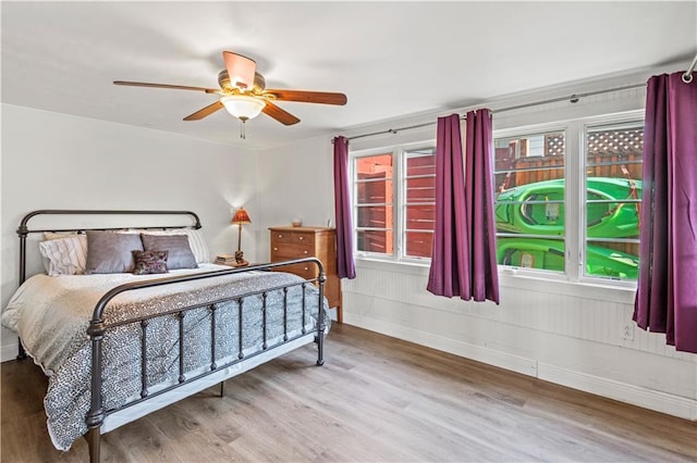 bedroom featuring ceiling fan and wood finished floors